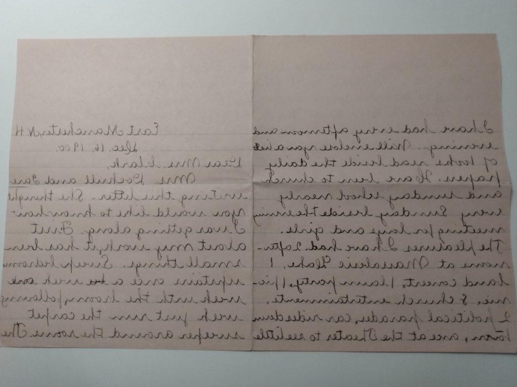 Color photograph of two pages of a letter, written with black ink on pink paper. The letter is addressed from East Manchester, N.H. on December 16, 1900, and begins “Dear Mrs. Clark.”