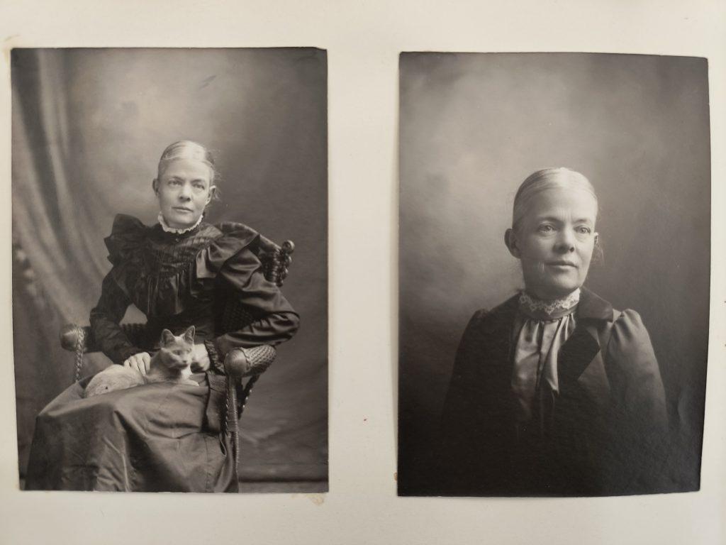 Two black-and-white studio portrait photographs of a white woman with gray hair. The photograph on the left is a close-up, and the photograph on the right depicts her seated with a cat on her lap. In both photographs, her hair is tied back behind her head, and she is dressed in dark clothing.